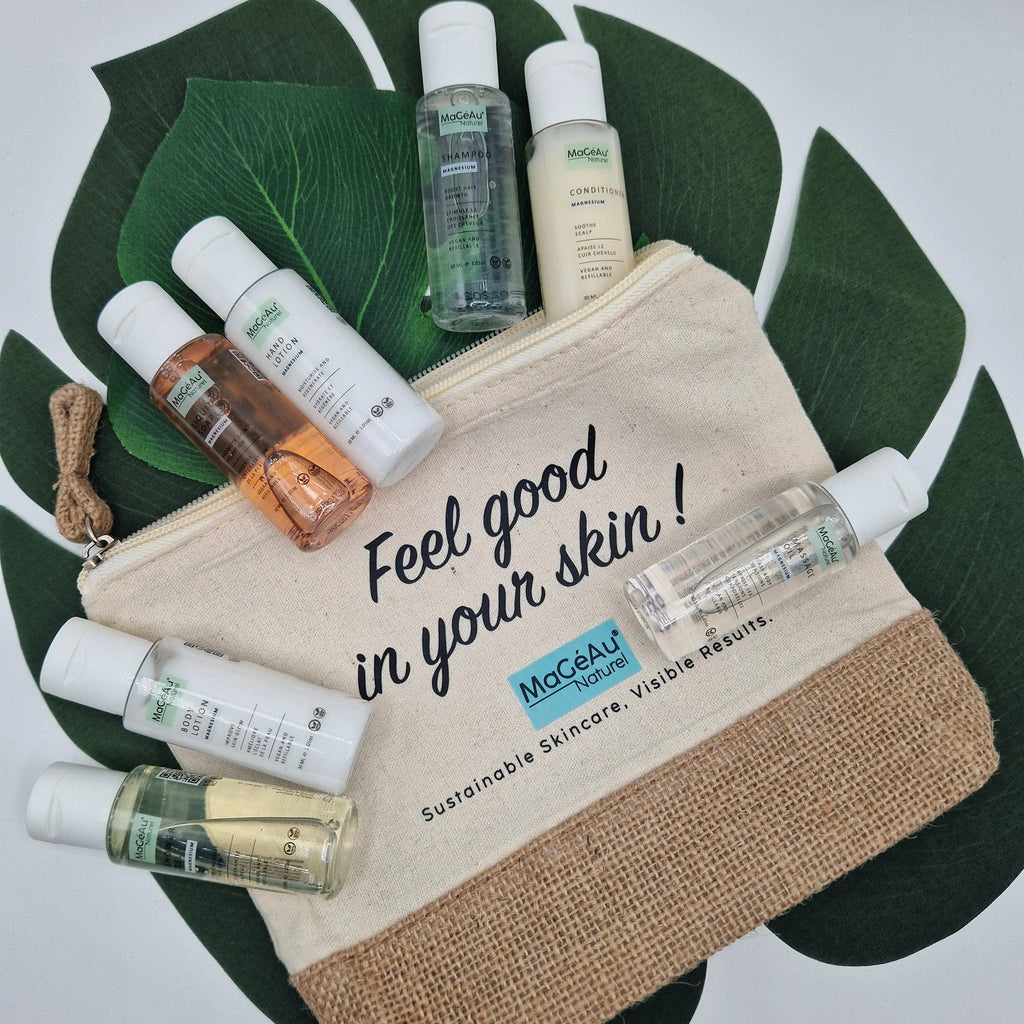 Cosmetic pouch with skincare products and 'Feel good in your skin!' text on a green leaf background