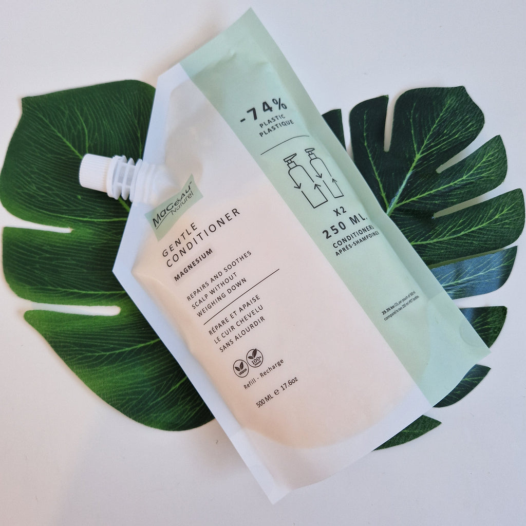 Mageau naturel magnesium Skincare product packaging on green leaves with visible brand name.