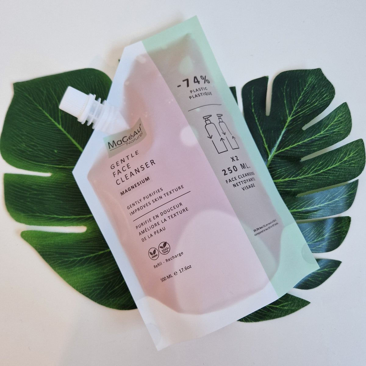 Mageau naturel magnesium Skincare product packaging on green leaves with a white background