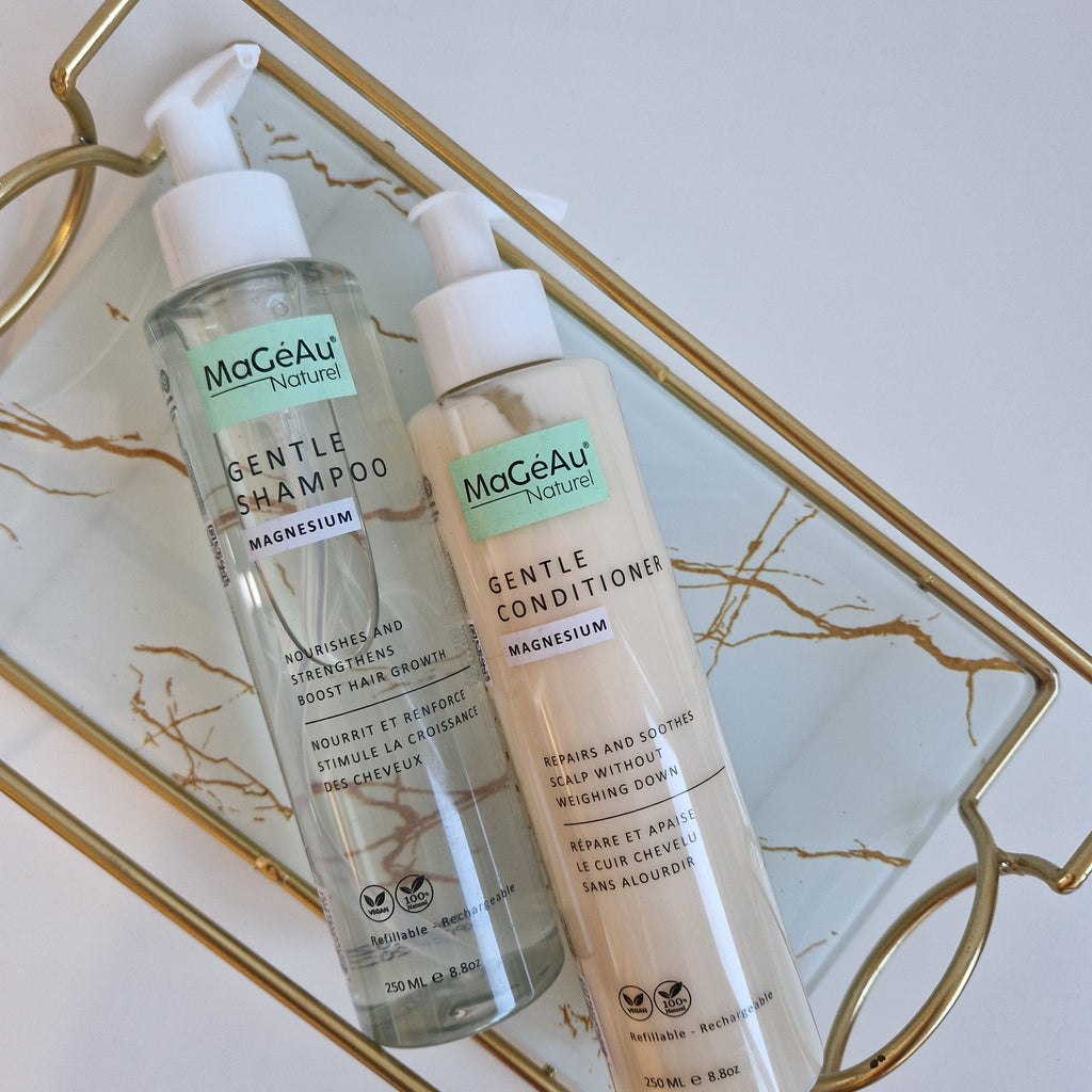 Two bottles of Mageau naturel magnesium  Gentle Shampoo and Gentle Conditioner on a decorative tray.